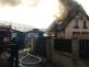 002 - požár rodinného domu Nupaky - kouř ze střechy.jpg