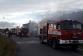 OLK_Požár RD ve Štěpánově_pohled na hořící objekt a zasahující hasiče