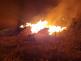 003-Požár hromady uskladněného dřeva v bývalém areálu Poldi Kladno