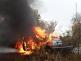 206-Požár osobního automobilu v plném rozsahu na hranici s Libereckým krajem poblíž Bezdězu