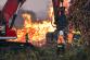 298-Nasazení těžké techniky ze ZÚ Jihlava při požáru hromady dřeva v bývalém areálu Poldi Kladno