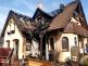 010 - poničená střecha rodinného domu po požáru Nupaky.jpg