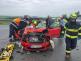 SČK_DN u Slaného_hasiči vyprošťují zraněnou osobu se zdemolovaného osobního vozu.jpg