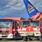 ZÚ_vykládka testů na covid na letišti Václava Havla_pohled na hasičská auta stojící na letištní ploše 