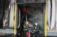 57_SČK_Požár mrazíren v Mochově_hasiči 2  proudy hasí uvnitř budovy.jpg